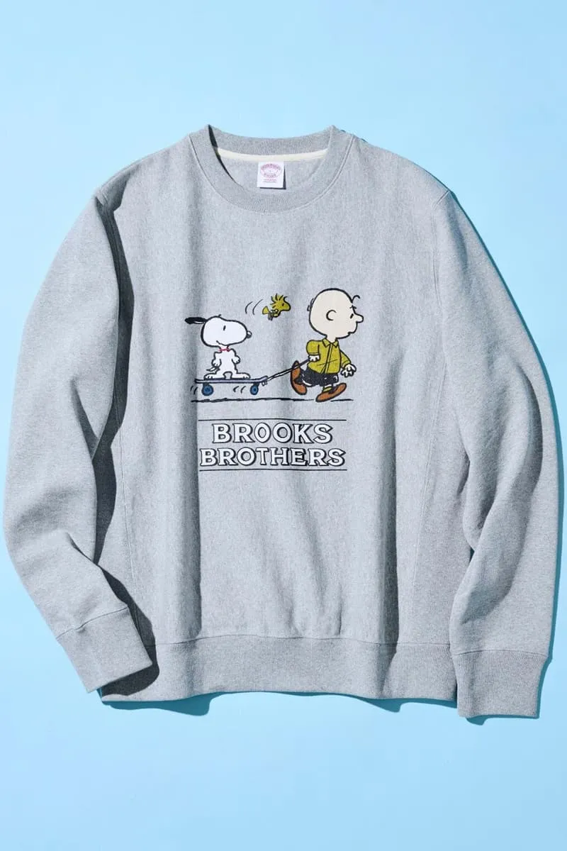 Sweat-shirt gris avec personnages de bande dessinée Charlie Brown et Snoopy.