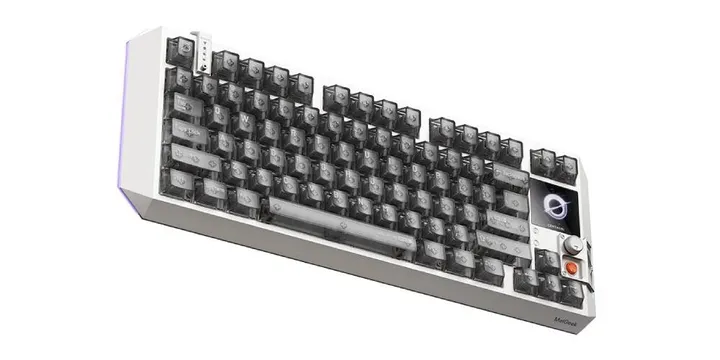 Clavier mécanique avec touches transparentes et cadran sur le côté droit.