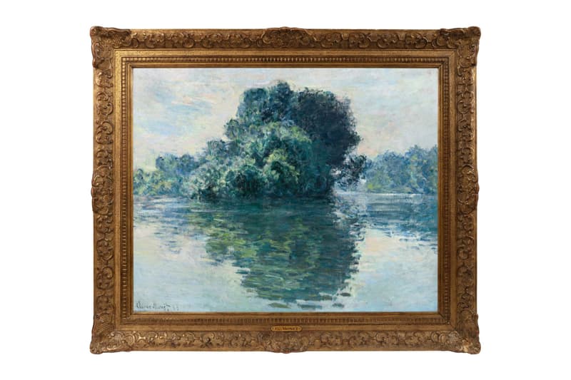 Peinture de paysage fluvial avec reflets sur l'eau dans un cadre orné.