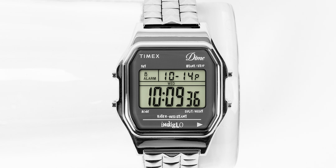 Montre numérique Timex argentée avec affichage de l'heure et de la date.