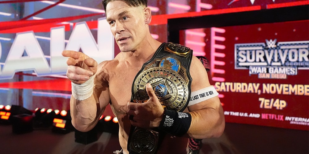 Lutteur avec ceinture de champion, fond Survivor Series, 18 novembre, San Diego.