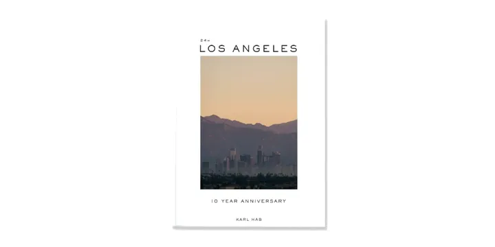 Livre avec couverture de Los Angeles, texte '10 Year Anniversary' et 'KARL HAB'.