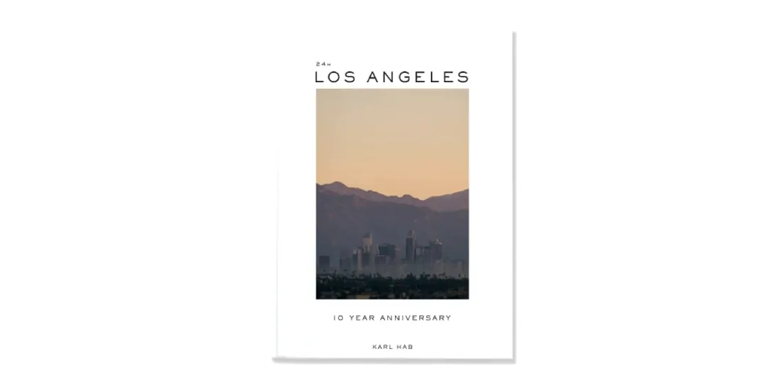 Livre avec couverture de Los Angeles, texte '10 Year Anniversary' et 'KARL HAB'.