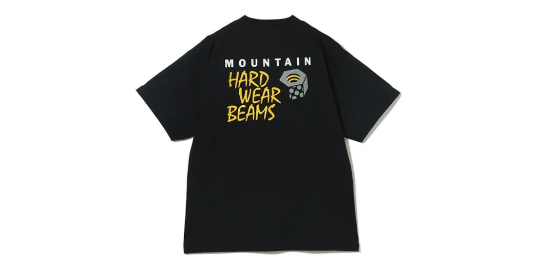 T-shirt noir avec texte Mountain Hard Wear Beams en jaune et blanc au dos.