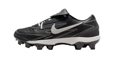 Chaussure de football noire avec logo blanc et crampons