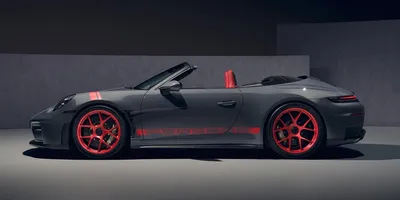 Voiture de sport décapotable grise avec détails rouges.