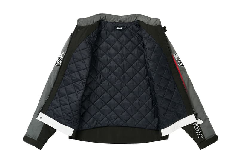 Veste ouverte avec doublure matelassée intérieure en noir et détails colorés à l'extérieur.