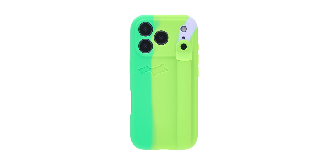 Étui de téléphone vert et jaune avec trois caméras.