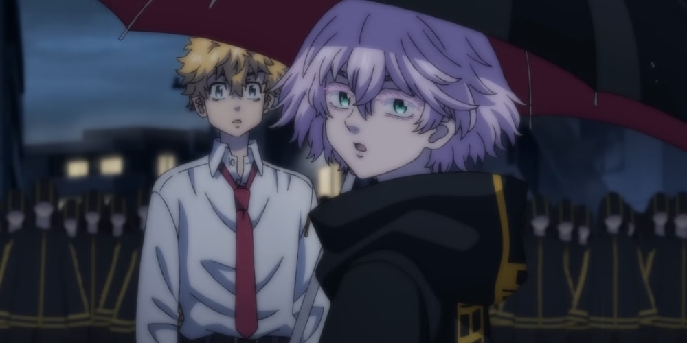 Deux personnages d'anime sous un parapluie rouge avec des expressions surprises.