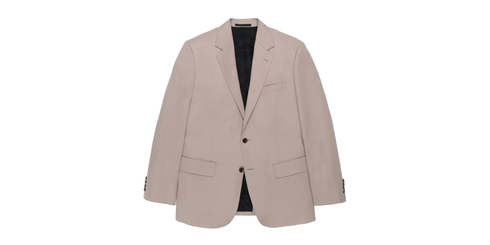 Veste beige avec deux boutons et doublure noire