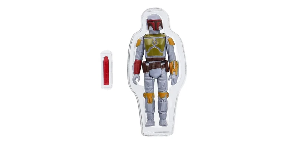 Figurine grise et rouge avec accessoire, en plastique transparent.