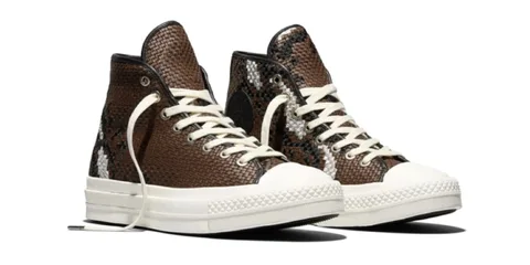 Baskets montantes en cuir marron avec motif serpent et semelle blanche