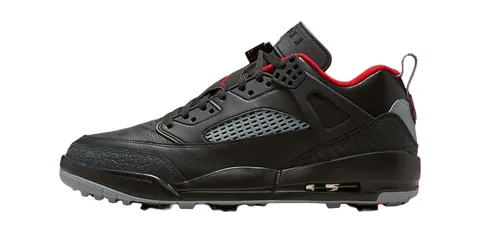 Chaussure noire et rouge avec détails complexes et semelle unique.