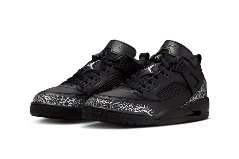 Chaussures noires avec motif imprimé, nervures et détails perforés.