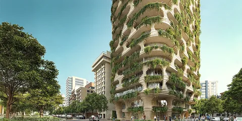 Immeuble écologique avec végétation sur la façade à plusieurs niveaux.