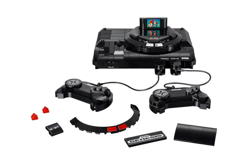 Console Sega Mega Drive avec deux manettes et un jeu inséré