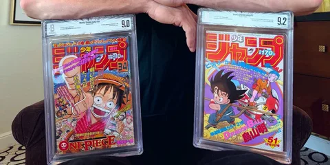 Deux mangas Shonen Jump dans des boîtes de protection notées 9.0 et 9.2.