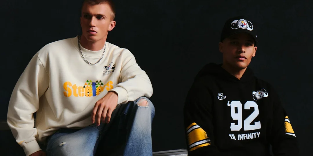 Deux hommes posent en sweatshirts et casquette.