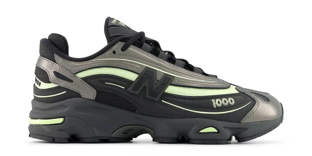 Baskets New Balance noires et vertes avec détails futuristes.