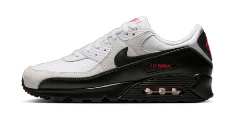 Baskets Nike Air Max blanches et noires avec swoosh noir.