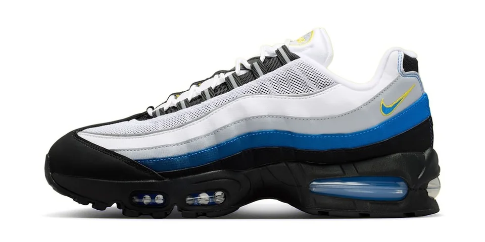 Basket Nike Air Max 95 en noir, blanc et bleu avec logo jaune.