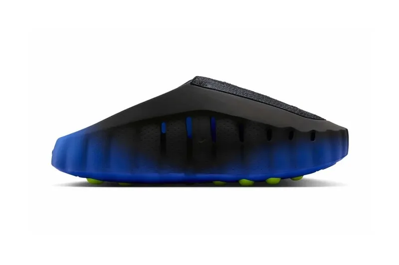 Chaussure noire avec semelle bleue et détails verts