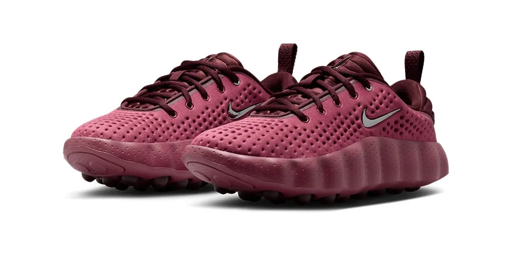 Chaussures sport roses avec motif perforé et logo Swoosh argenté