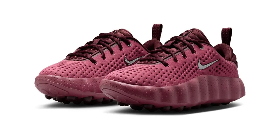 Chaussures sport roses avec motif perforé et logo Swoosh argenté