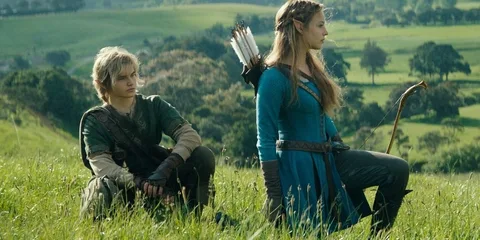 Deux personnages médiévaux dans un paysage champêtre