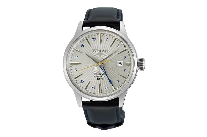 Montre Seiko Presage avec cadran argenté et bracelet noir.