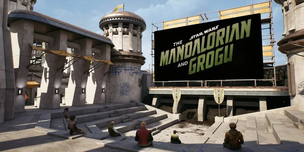 Spectateurs devant un écran extérieur 'The Mandalorian and Grogu'