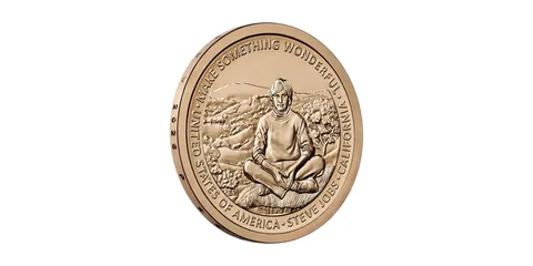 Médaille gravée avec portrait et texte autour.