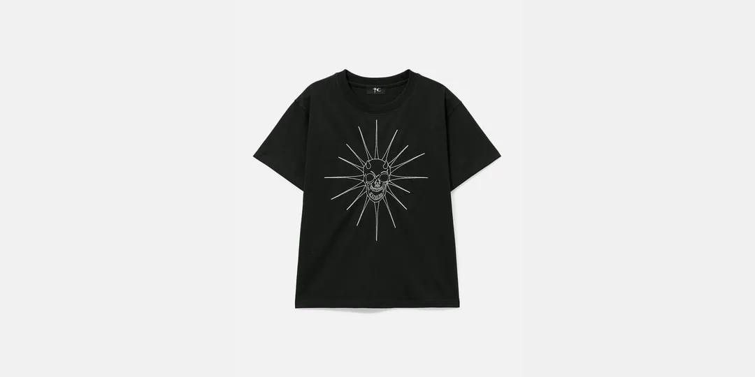 T-shirt noir avec motif crâne et rayons blancs