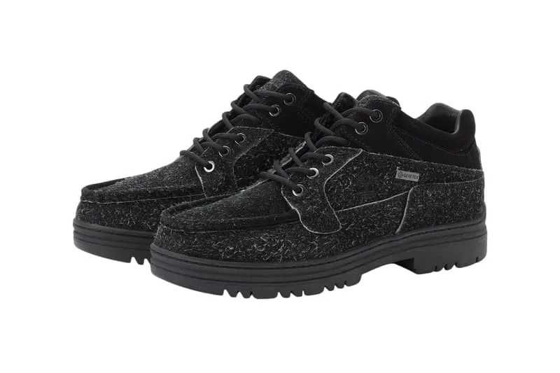 Chaussures noires en laine avec semelle épaisse, style décontracté.