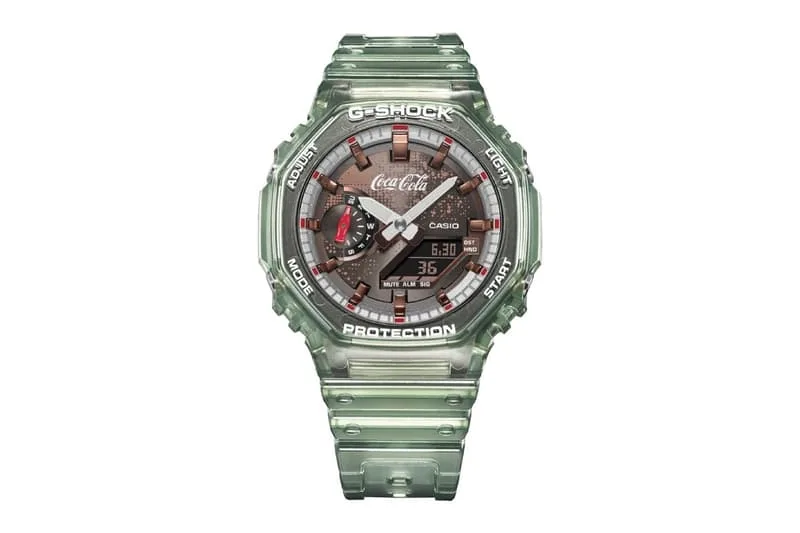 Montre G-Shock Casio verte avec logo Coca-Cola sur le cadran.