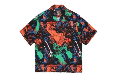 Chemise imprimée aux couleurs vives et dessins artistiques, manches courtes.